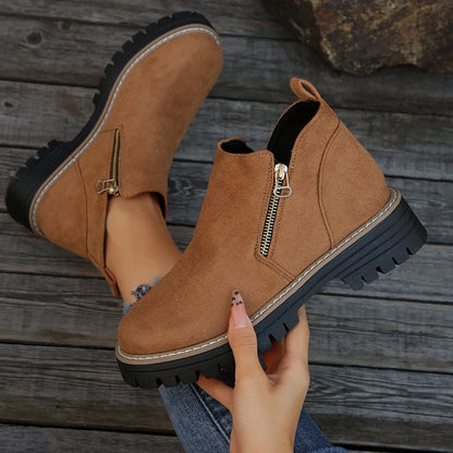 Bottines tendance pour femme avec fermeture éclair latérale.