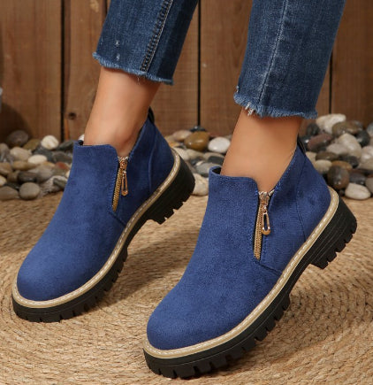 Bottines tendance pour femme avec fermeture éclair latérale.