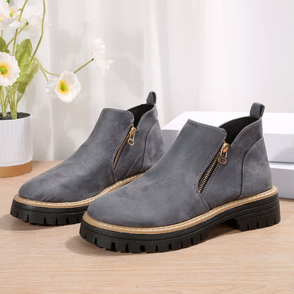 Bottines tendance pour femme avec fermeture éclair latérale.